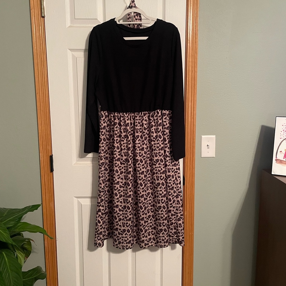 Long sleeved, animal print dress 1X